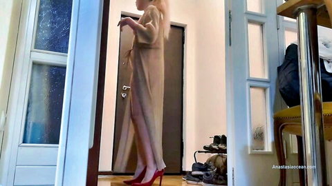 Blonde hotwife in sheer beige dress and red heels teasing at door