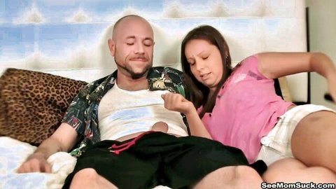 Brunette MILF giving blowjob to bald man in Hawaiian shirt