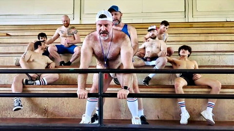 Hairy muscular bearded daddies in tight gym singlets bulge on bleachers for rough gay sports gangbang
