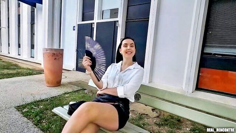 Zoe Doll in sexy office skirt and blouse, fanning outdoors with big ass tease