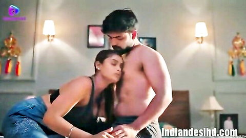 Indian couple in intimate foreplay embrace, muscular man and curvy woman
