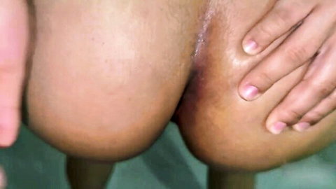 Hands spreading perfect amateur ass cheeks exposing gaping anus with dripping anal creampie