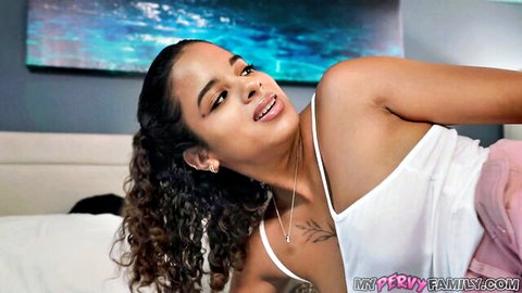 Isabella Jules teases with stepsister pussy peek, exposing ass on bed