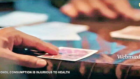 Hand holding pink card in Nurse Ullu web series scene, 2024