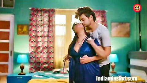Busty Indian babe in blue satin nightie passionately kissed on neck by lover