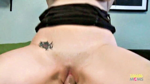Chubby babe's shaved pussy close-up with tattoo and collar