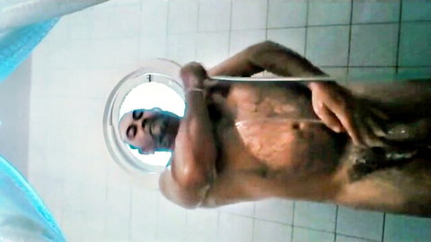 Nude mature muscular man showering solo, explicit view