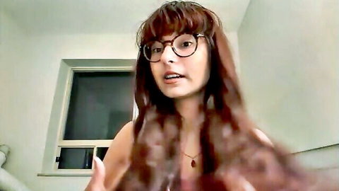 Elisehart petite camgirl with glasses, long brown hair in Chaturbate show