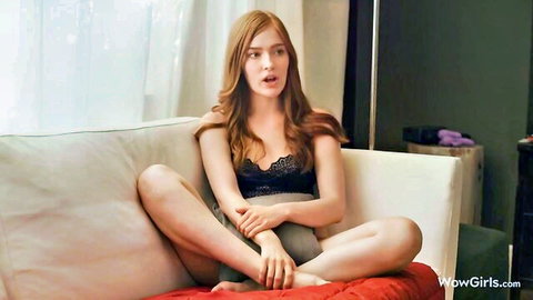 Skinny redhead teen in black lace lingerie spreads legs wide on couch teasing