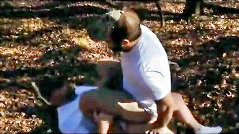 Gay outdoor anal sex as man in cap fucks bent-over guy's ass doggy style