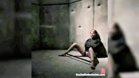 Bound superheroine Americana exposed and spread in captivity