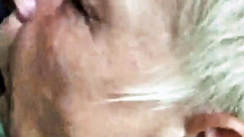 Granny with green hair wide-eyed open mouth blowjob closeup