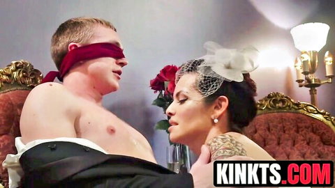Zane Anders blindfolded in wedding embrace with TS Foxxy