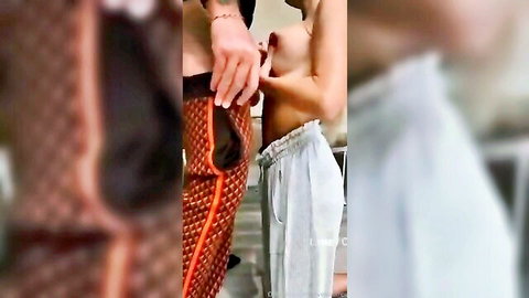 Spanish woman in orange pants teasing shirtless man with hand on chest