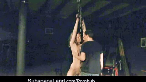 Gitta Blond naked chained submissive blonde in BDSM whipping scene