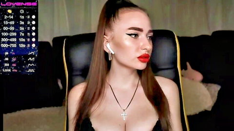 Brunette webcam babe with big tits flashes deep cleavage in black top