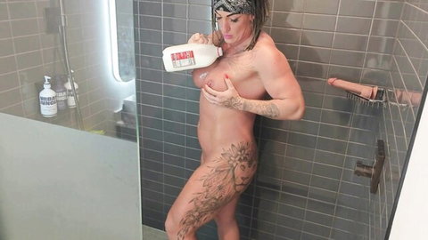 Dana X Muscles nude muscular body bathed in milk in shower
