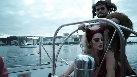 Karine Barros topless with Kenia Barbara on yacht in Stella Models nude scene