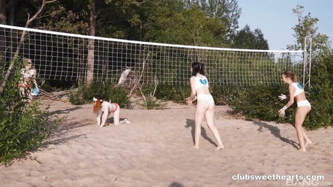 Russian teens in bikinis play beach volleyball before wild orgy