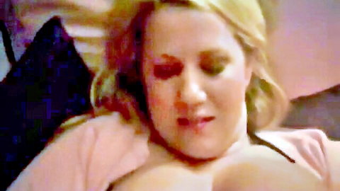 Blonde amateur babe with big tits and parted lips in closeup tease