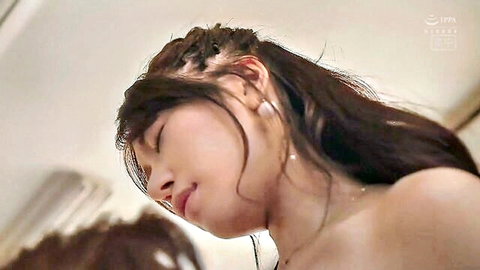 Asian woman in ecstasy, close-up face during intimate creampie sex