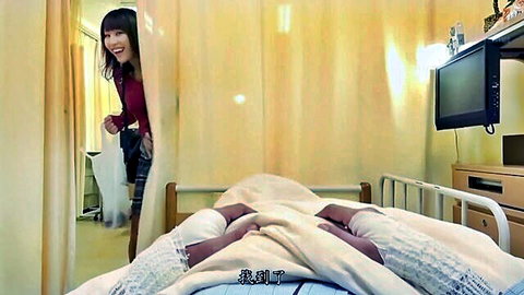 Japanese woman in red top peeks smiling at man in bed with lacy white stockings