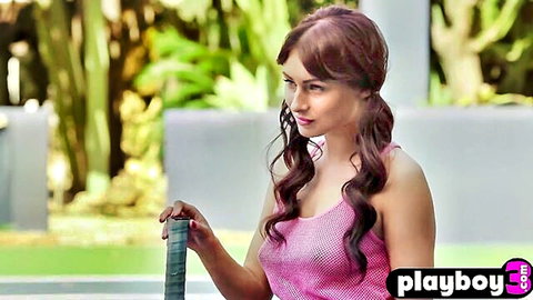 Demi Fray MILF posing outdoors in pink top, showcasing big ass and curves