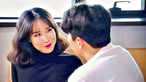 Korean babe in black turtleneck gazes seductively at handsome East Asian man in intimate close-up