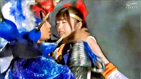 Japanese sentai cosplay couple in armored embrace, intense moment