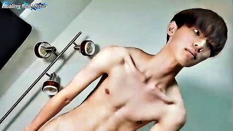 Slim naked Asian teen boy poses nude in shower with toned abs and stretched neck