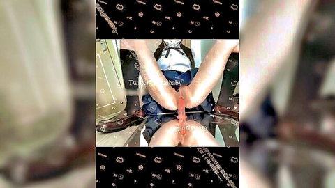 Asian schoolgirl in skirt masturbating with pink dildo, mirror reflection