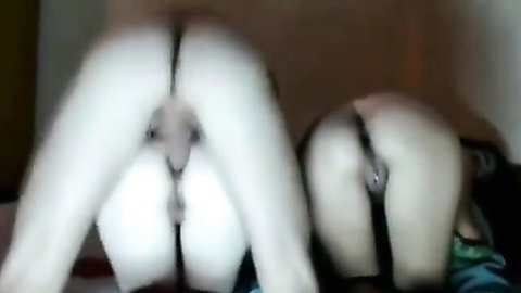 Two pale amateur sluts bent over doggystyle exposing wet pussies and asses