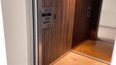 Jade in luxurious elevator during sexy Phuket escape