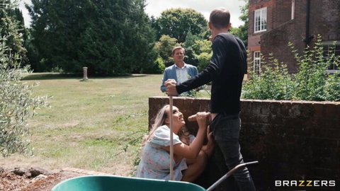 Big assed blonde in dress stuffed by two men outdoors in garden