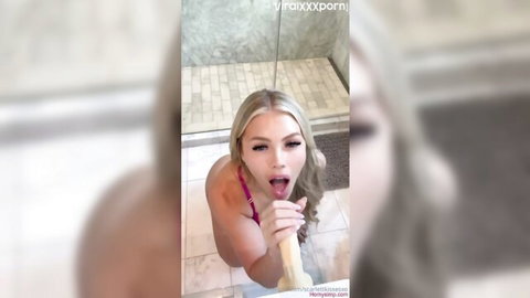 Scarlettkissesxo blonde babe teases with dildo in mouth in steamy bathroom