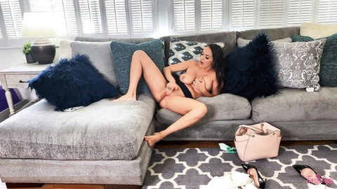 Sofi Ryan nude, legs spread wide on couch, teasing pussy solo