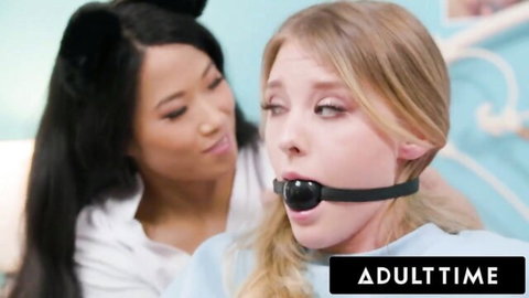 Alona Bloom kisses ball-gagged Melody Marks in futa lesbian tease