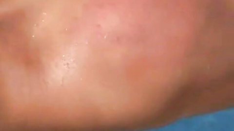 Blonde woman distressed face in pain, red flushed skin and tears, BDSM thumbnail