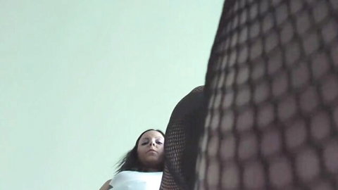 Carla in fetish POV femdom lesbian scene with fishnet stockings