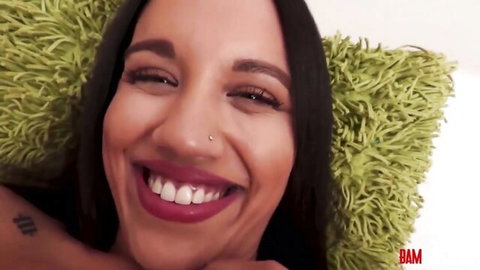 Alison Rey smiling seductively in hardcore lesbian scene with Nina White