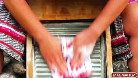 Horny Asian MILF in traditional skirt washing cloth sensually