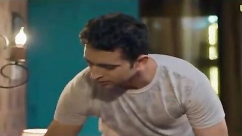 Handsome Indian man in gray t-shirt, intense side gaze from Ullu erotic series