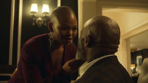 Rosemary Zimu in sexy maroon dress touching older man's face, Savage Beauty hot scene