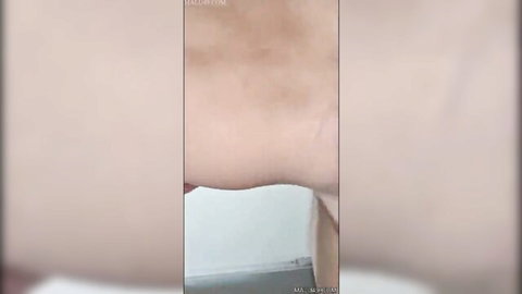 Sexy Indian Boudi exposing her large bare breasts in close-up