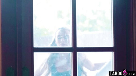 Blonde MILF stepmom peeking through foggy window in sheer top