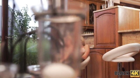 Blurry nude white babe with big ass sitting on kitchen bar stool