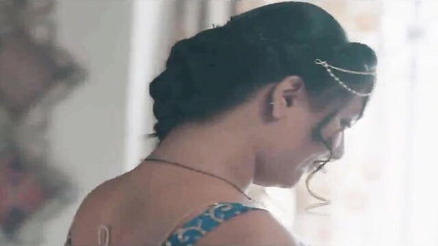 Sexy Indian brunette babe in saree and maang tikka showing profile view with curves