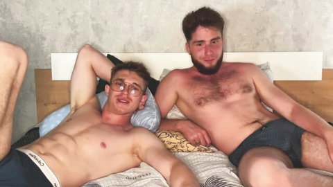 Mark Stiff and muscular friend flexing shirtless in underwear on bed, gay thumbnail