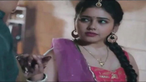 Sexy Indian brunette in purple saree with deep cleavage touched intimately by man