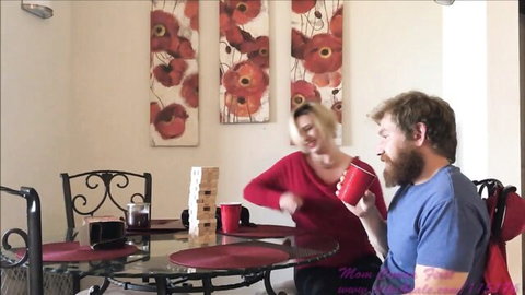 Brianna Beach as sexy aunt smiles at nephew while playing Jenga game